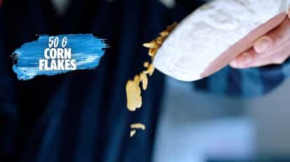 Adding Cornflakes into a mixing bowl to make Warhol's Milk Punch