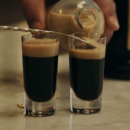 Two Baby G shots beside a bottle of