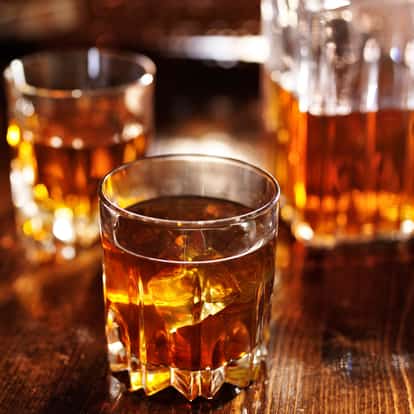 Two Rocks Glasses filled with Scotch.