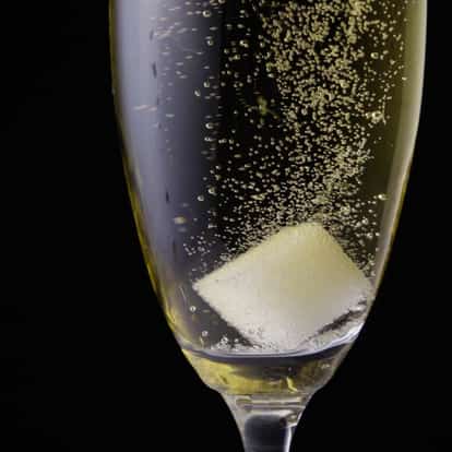 Sugar Cube (white) in a flute of sparkling wine