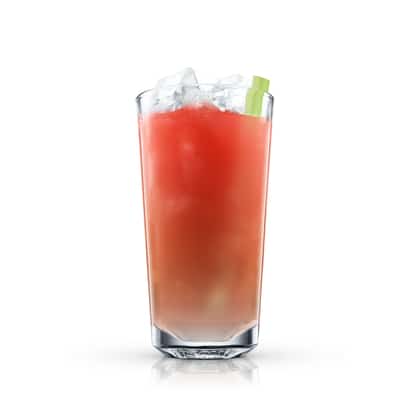 Bloody Caesar served in a highball glass with ice and a celery stick on white background