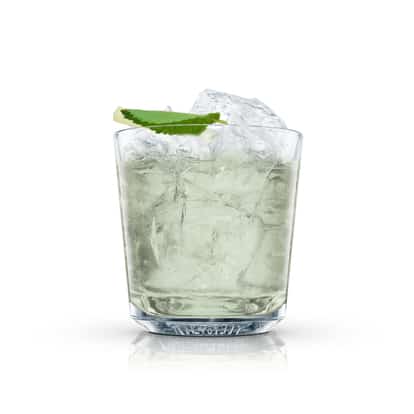 Absolut Bluey in a rocks glass with crushed ice, lime wedge and mint leaf on white background