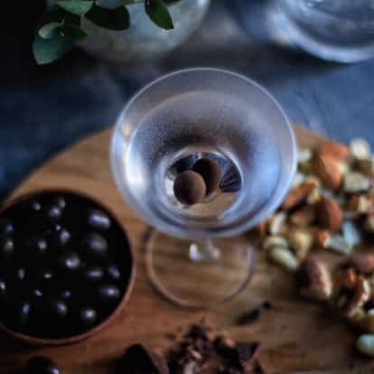 Chocolate Martini garnished with an almond in a Martini Glass