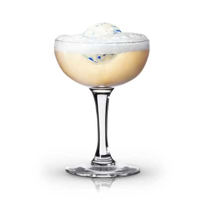 Absolut Cobalt Cloud in a coupe glass with a foam head topped by a scoop of ice cream on white background