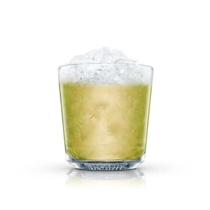 Absolut Kiwi in a rocks glass topped with crushed ice on white background
