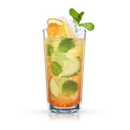 Absolut Kreuzberger Schraube served in a highball glass with ice, cucumber slices, mint sprig and orange wedge