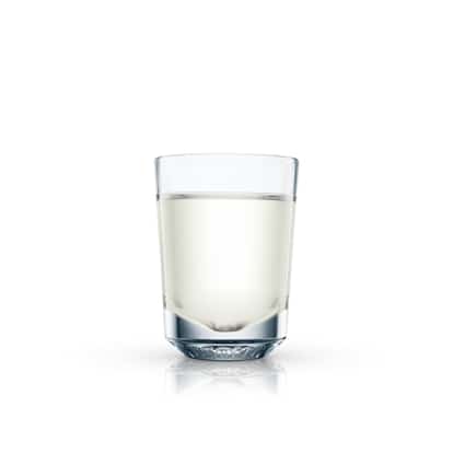 Absolut Litchi Shooter served in a shot glass on white background