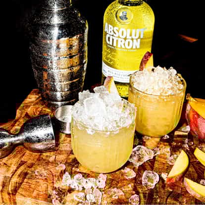 Absolut Mango Crush next to a bottle of Absolut Citron.