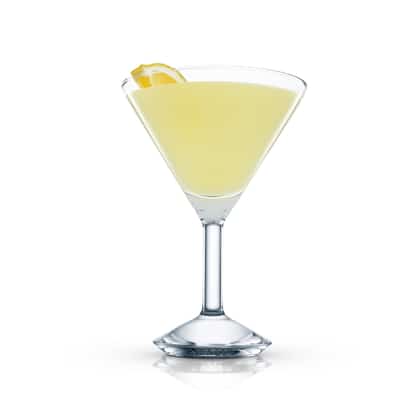 Absolut Mango Crustation in a stemmed martini glass garnished with a lemon wedge on white background