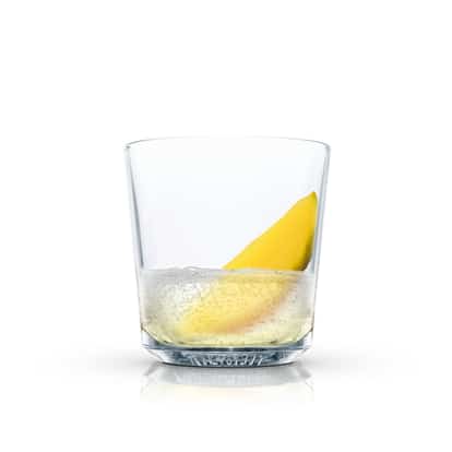 Absolut Mango Fizz in a rocks glass with mango wedge on white background