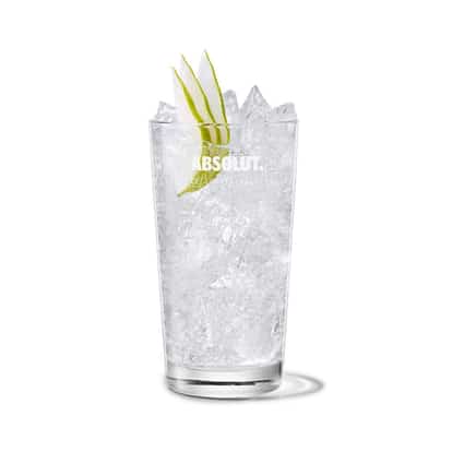 Pears & Lemon-lime Soda in an Absolut highball glass with crushed ice and pear slices on white background