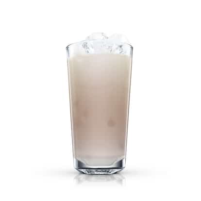 Absolut Peppar White Russian in a highball glass with ice on white background