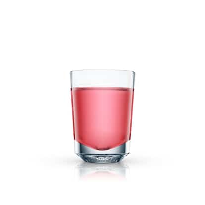 Absolut Raspberry Shooter in a shot glass on white background.
