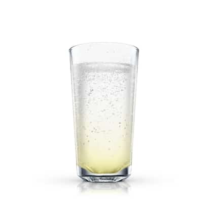 Sparkling cocktail with pale yellow base in a tall highball glass on white background.
