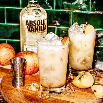 Absolut Vanilia fluffy next to a bottle of Absolut Vanilia vodka