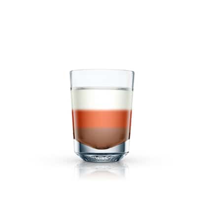 Alice From Dallas layered in a shot glass on white background