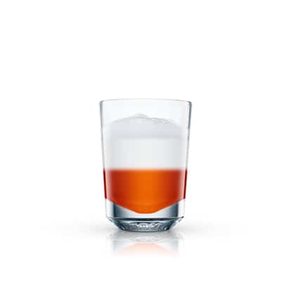 Angels Kiss 2 in a rocks glass with a bottom liqueur layer and a top foam layer on white background