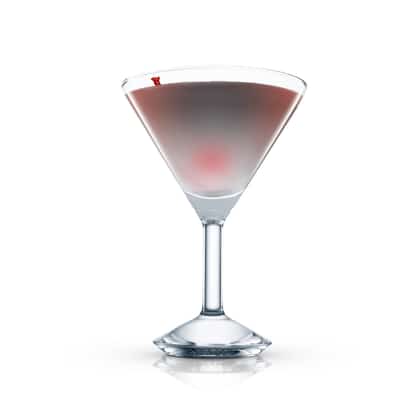 Angel's Tip in a martini glass with a cherry at the bottom and a peel on the rim on white background