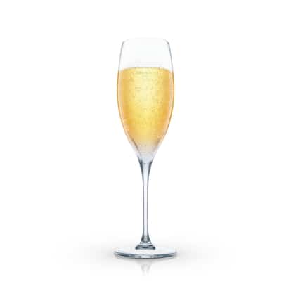 Apples And Pears in a champagne flute on white background