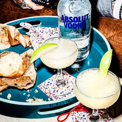 A classic Appletini cocktail made with Absolut Vodka, served in a Martini glass