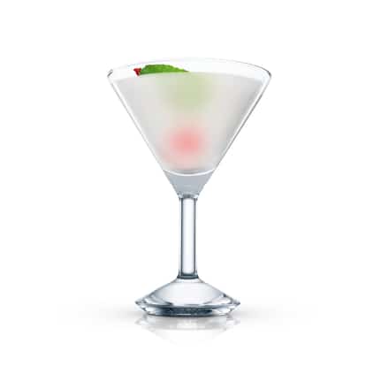 Arctic served in a martini glass with a mint leaf and a cherry on white background