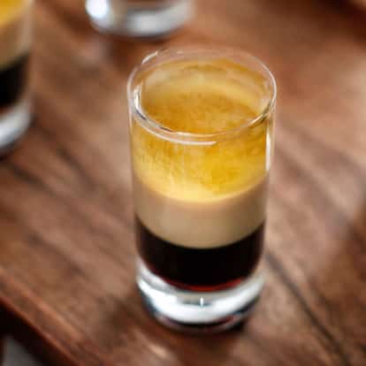 Colorful B-52 shot layered with Kahlúa Coffee Liqueur, Cream Liqueur and Triple Sec.