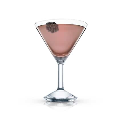 Black Bison Martini served in an Absolut martini glass with a blackberry garnish on white background.