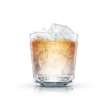 Black Hawk in an Absolut rocks glass with crushed ice on white background