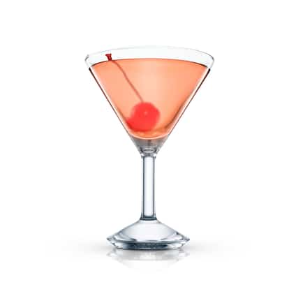 Blanche served in an Absolut martini glass with a maraschino cherry on a stem