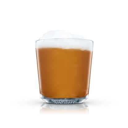 Boston Sour in an Absolut rocks glass with foam on white background
