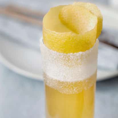 Brandy Crusta in a tall sugar-rimmed glass with a lemon peel