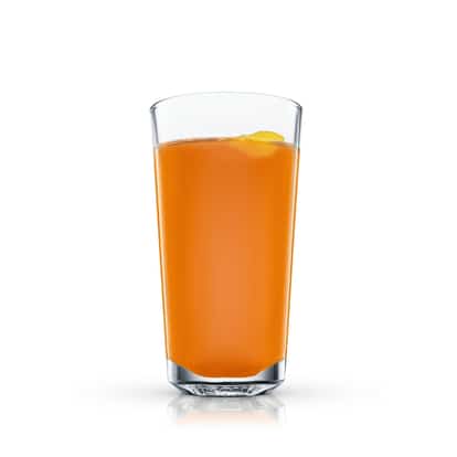 Buttergrog in a highball glass with a lemon peel on white background