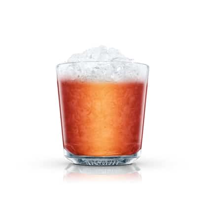 Canadian served in an Absolut rocks glass with crushed ice on white background
