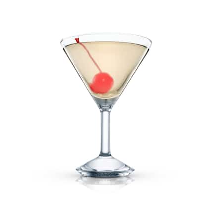 Light yellow cocktail served in a stemmed martini glass with a maraschino cherry on white background.