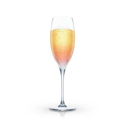 Champagne Cosmo in a champagne flute on white background