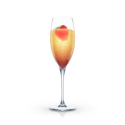 Champagne Fraise served in a champagne flute with a strawberry on white background.