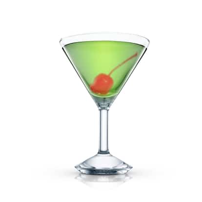Chartini served in a martini glass with a cherry and stem on white background