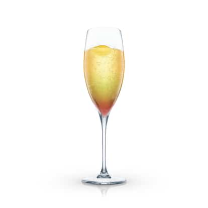 Chartreuse Champagne in a champagne flute with lemon twist
