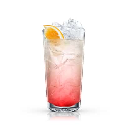 City Rickey in a highball glass with crushed ice and an orange wedge on white background