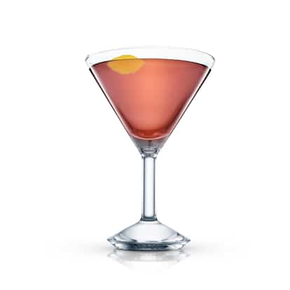 Copain Special in a martini glass with lemon twist garnish on white background