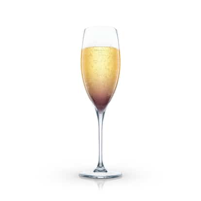 Crevasse in a champagne flute with layered ingredients on white background