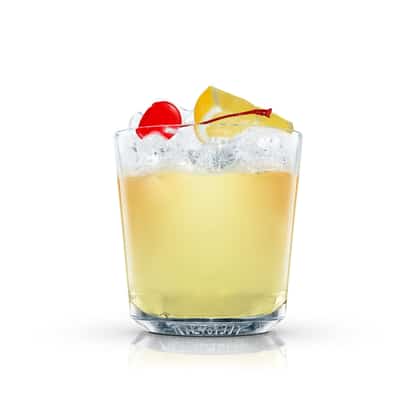 Diamond Fizz in an Absolut rocks glass filled with crushed ice topped with a lemon wedge and maraschino cherry