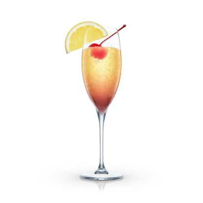 Eden Rocks in a champagne flute with a lemon wedge and a maraschino cherry on a pick on white background