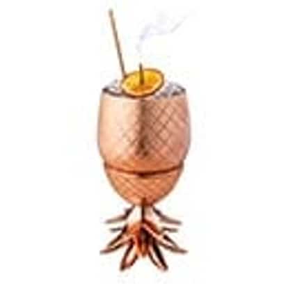 Orchard in a metal goblet with citrus wheel and smoking garnish