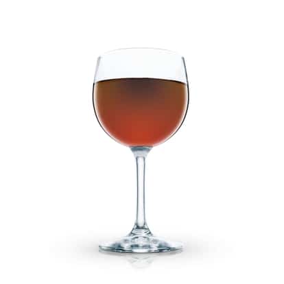 Flaming Heart in a stemmed wine glass on white background