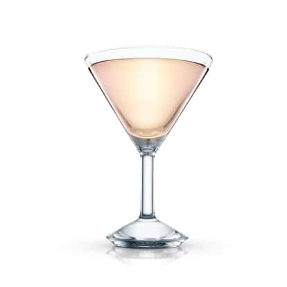 Flora Macdonald in a martini glass with a clear stem on white background
