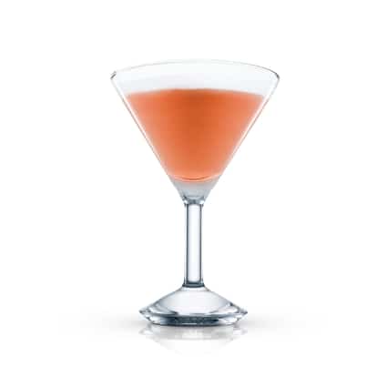 Flying High in a martini glass with froth on white background
