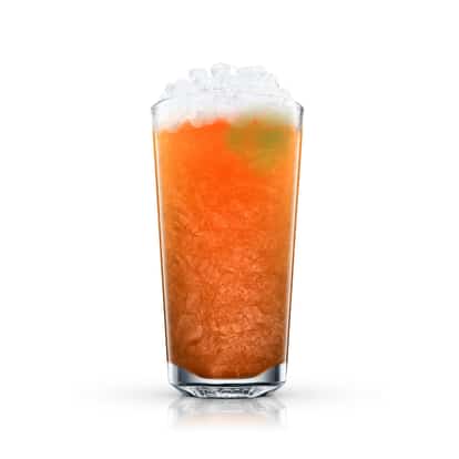 Georgia Mint Julep in a highball glass filled with crushed ice and topped with a mint sprig on white background
