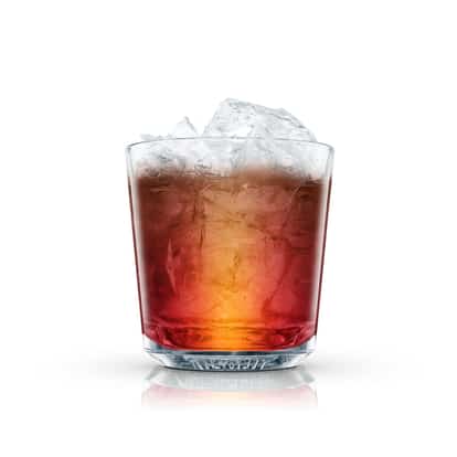 Gizmo in an Absolut rocks glass topped with crushed ice on white background
