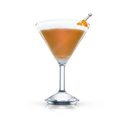Golden Girl in a martini glass with an orange twist on a pick on white background